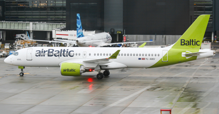 Photo of YL-ABO - Air Baltic Airbus A220-300 at LHR on AeroXplorer Aviation Database