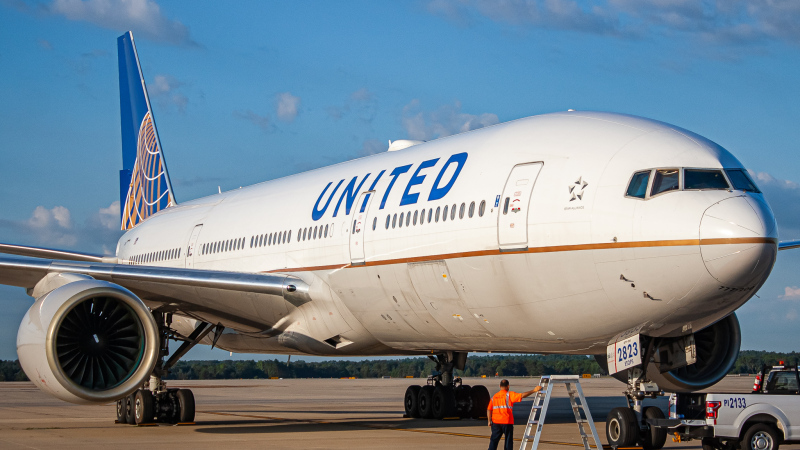 Photo of N223UA - United Airlines Boeing 777-200ER at IAD on AeroXplorer Aviation Database