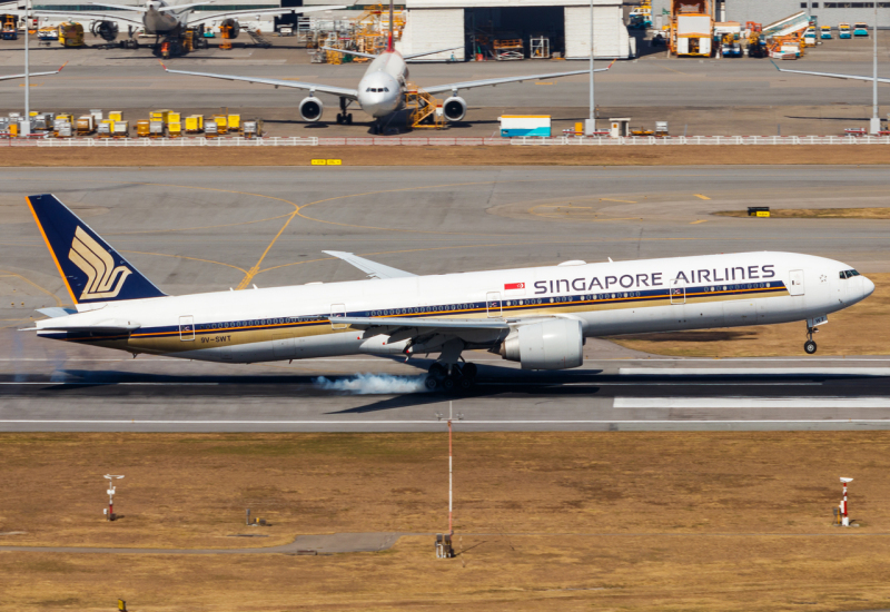 Photo of 9V-SWT - Singapore Airlines Boeing 777-300ER at HKG on AeroXplorer Aviation Database