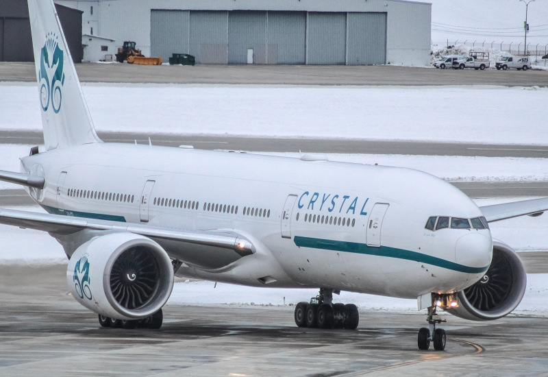 Photo of P4-XTL - Crystal AirCruises Boeing 777-200LR at MKE on AeroXplorer Aviation Database
