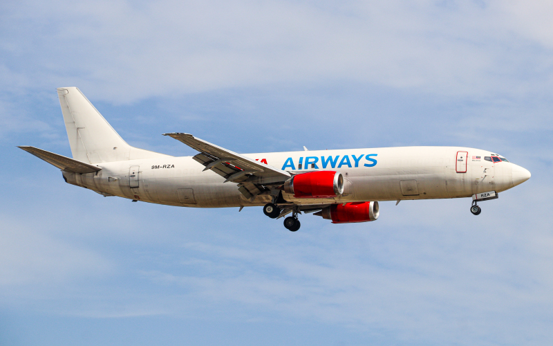 Photo of 9M-RZA - RAYA AIRWAYS Boeing 737-400F at HKG on AeroXplorer Aviation Database