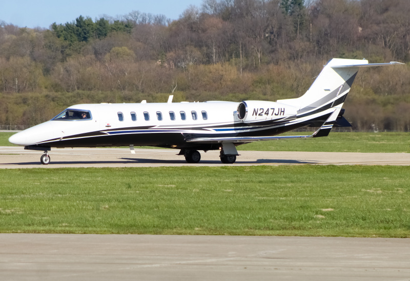 Photo of N247JH - PRIVATE Learjet 45 at LUK on AeroXplorer Aviation Database
