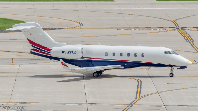 Photo of N302KC - PRIVATE Bombardier Challenger 300 at MKE on AeroXplorer Aviation Database