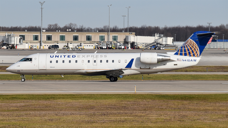 Photo of N410AW - United Express Mitsubishi CRJ-200 at GRR on AeroXplorer Aviation Database