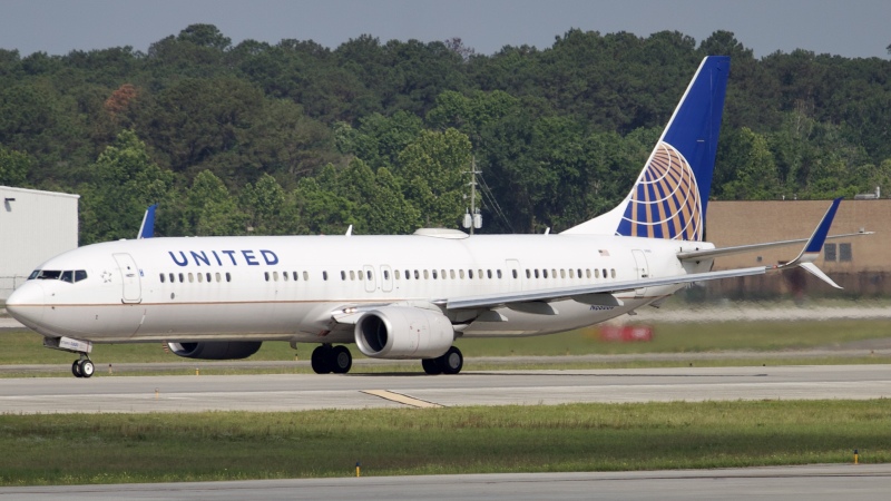 Photo of N68880 - United Airlines Boeing 737-900ER at IAH on AeroXplorer Aviation Database