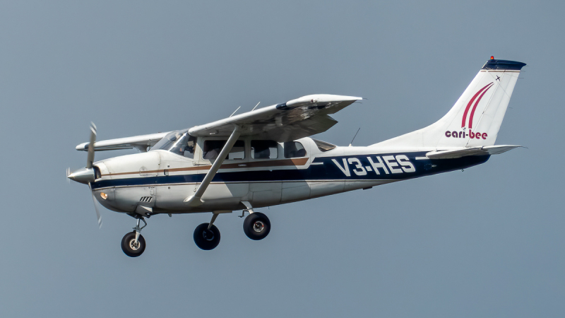 Photo of V3-HES - Cari-bee Air Services Cessna 206 at BZE on AeroXplorer Aviation Database