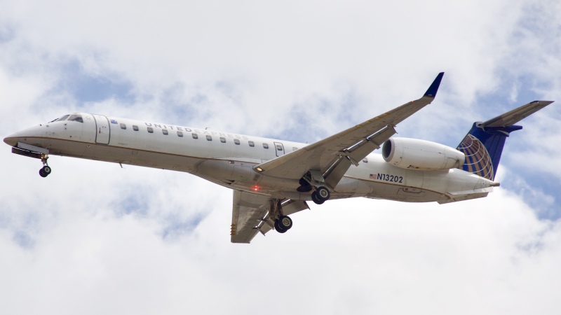 Photo of N13202 - United Express Embraer ERJ145 at IAH on AeroXplorer Aviation Database