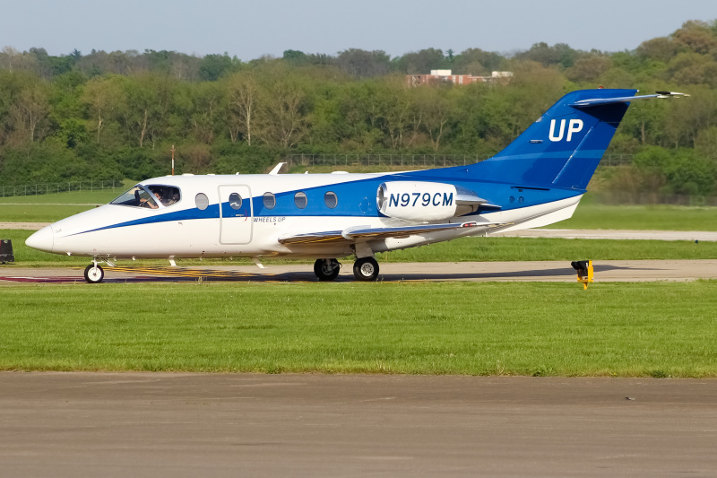 Photo of N979CM - Wheels Up Beechcraft Hawker 400 at LUK on AeroXplorer Aviation Database