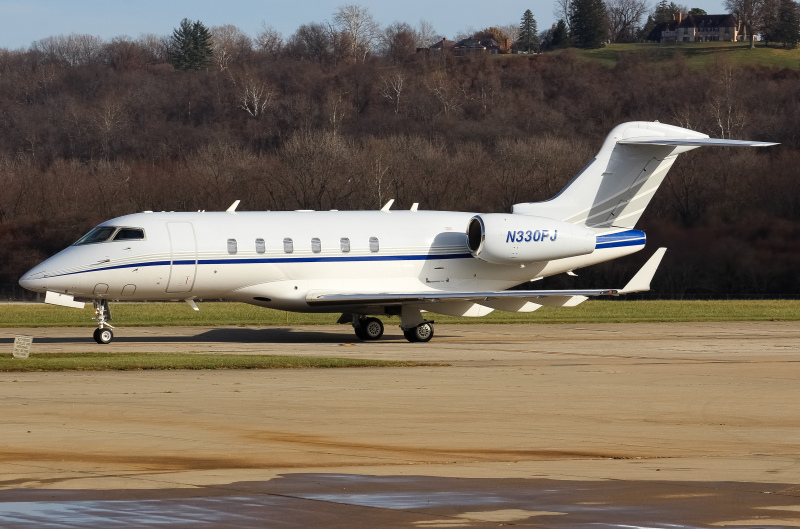 Photo of N330PJ - PRIVATE  Bombardier Challenger 350  at LUK on AeroXplorer Aviation Database