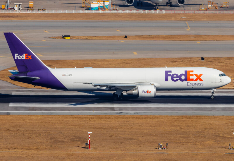 Photo of N104FE - FedEx Boeing 767-300F at HKG on AeroXplorer Aviation Database