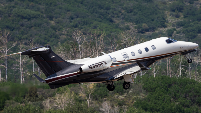 Photo of N365FX - FlexJet Embraer Phenom 300 at ASE on AeroXplorer Aviation Database