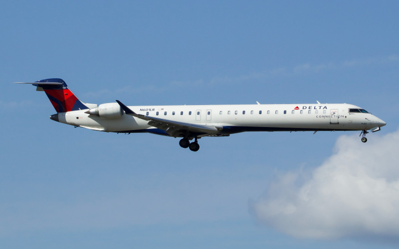 Photo of N601LR - Delta Connection Mitsubishi CRJ-900 at EWR on AeroXplorer Aviation Database