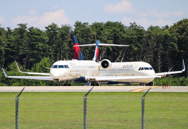 Photo of N319PQ - Delta Connection Mitsubishi CRJ-900 at BWI on AeroXplorer Aviation Database