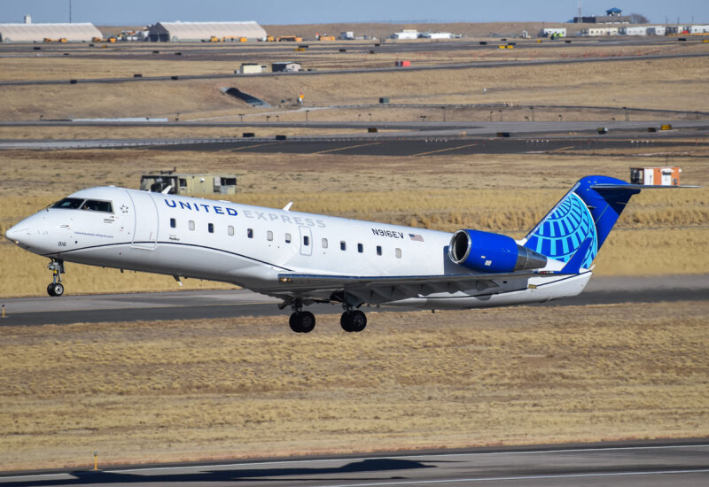 Photo of N916EV - United Express Mitsubishi CRJ-200 at DEN on AeroXplorer Aviation Database