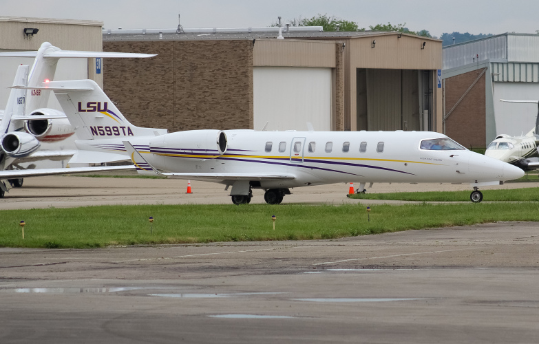 Photo of N599TA - Louisiana State University  Learjet 45 at LUK on AeroXplorer Aviation Database