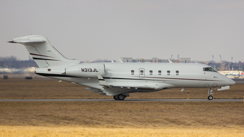 Photo of N313JL - PRIVATE Bombardier Challenger 300 at CMH on AeroXplorer Aviation Database