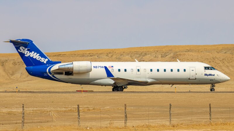 Photo of N879AS - SkyWest Airlines Mitsubishi CRJ-200 at CNY on AeroXplorer Aviation Database