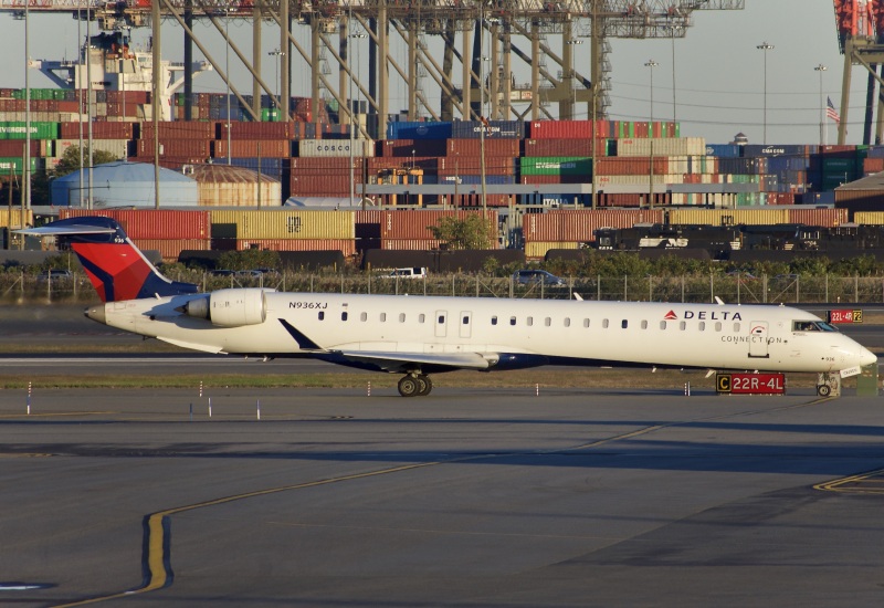 Photo of N936XJ - Delta Connection Mitsubishi CRJ-900 at EWR on AeroXplorer Aviation Database