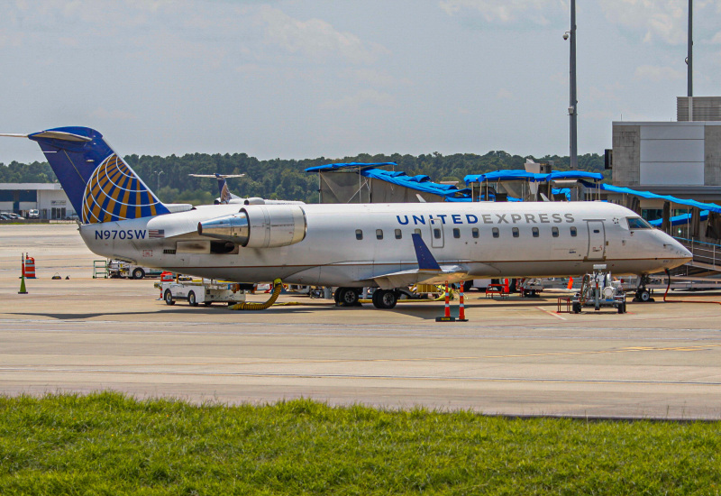 Photo of N970SW - United Express  Mitsubishi CRJ-200 at IAH on AeroXplorer Aviation Database