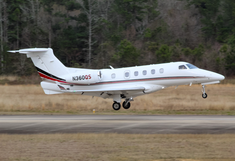 Photo of N360QS - NetJets Embraer Phenom 300 at CXO on AeroXplorer Aviation Database