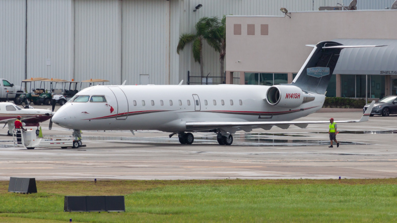 Photo of N141SH - PRIVATE Mitsubishi CRJ-200 at DAB on AeroXplorer Aviation Database