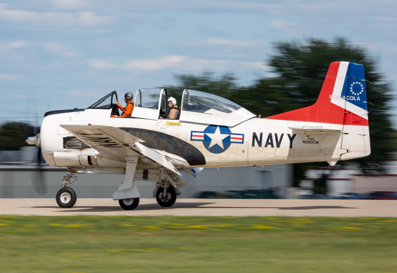 Photo of N280CM - PRIVATE North American T-28B at OSH on AeroXplorer Aviation Database