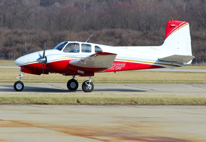 Photo of N82SP - PRIVATE  Beechcraft D50A at LUK on AeroXplorer Aviation Database
