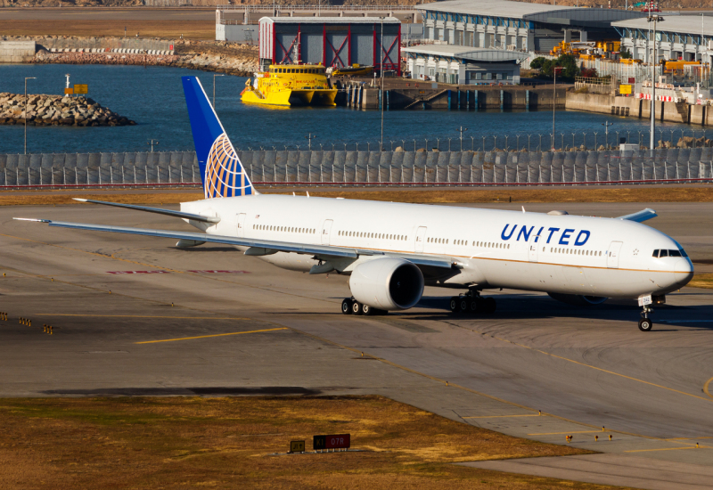 Photo of N2142U - United Airlines Boeing 777-300ER at HKG on AeroXplorer Aviation Database