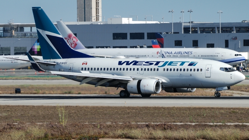 Photo of C-FWSY - WestJet Boeing 737-700 at LAX on AeroXplorer Aviation Database