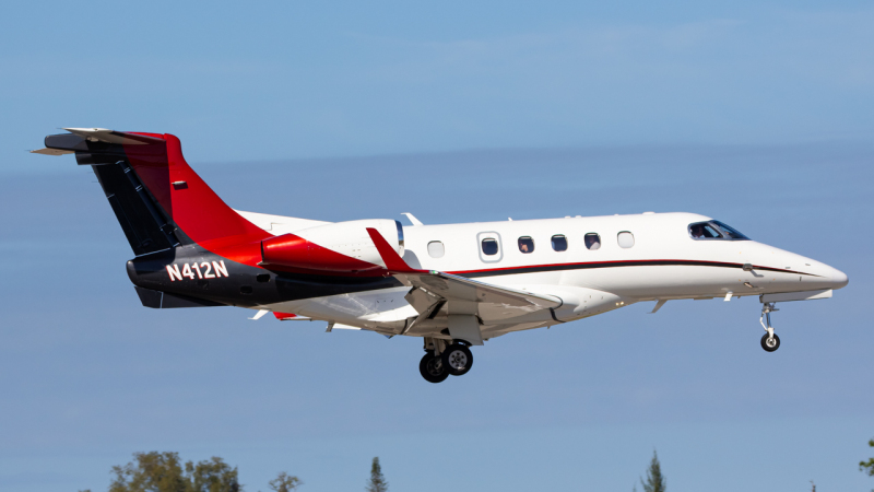 Photo of N412N - PRIVATE Embraer Phenom 300 at APF on AeroXplorer Aviation Database