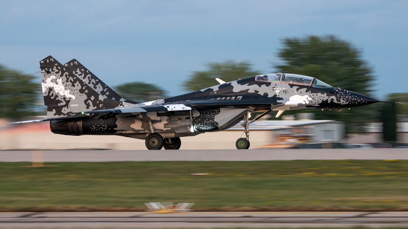 Photo of N29UB - PRIVATE Mikoyan-Gurevich MiG-29 at OSH on AeroXplorer Aviation Database