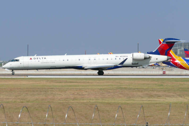 Photo of N538CA - Delta Connection Mitsubishi CRJ-900 at AUS on AeroXplorer Aviation Database