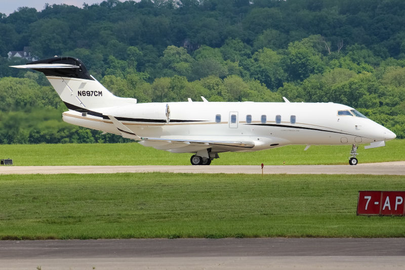 Photo of N697CM - PRIVATE  Bombardier Challenger 350  at LUK on AeroXplorer Aviation Database