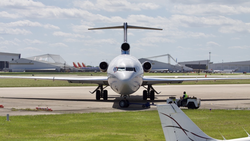 Photo of N794AJ - PRIVATE Boeing 727-200 at HOU on AeroXplorer Aviation Database