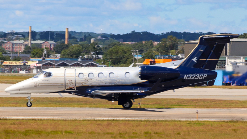 Photo of N323GP - PRIVATE Embraer Phenom 300 at PVD on AeroXplorer Aviation Database