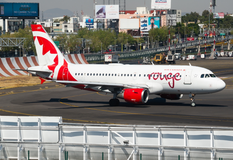 Photo of C-GBIJ - Air Canada Rouge Airbus A319 at MEX on AeroXplorer Aviation Database