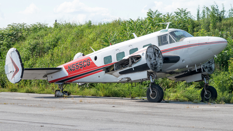 Photo of N555CG - PRIVATE Beech 18 at ILG on AeroXplorer Aviation Database