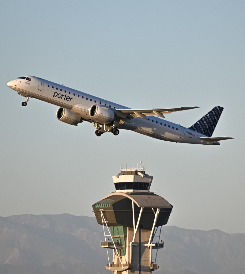 Photo of C-GKOR - Porter Airlines Embraer E195-E2 at LAX on AeroXplorer Aviation Database