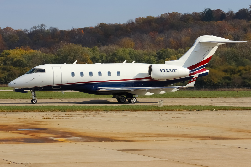 Photo of N302KC - PRIVATE Bombardier Challenger 300 at LUK on AeroXplorer Aviation Database