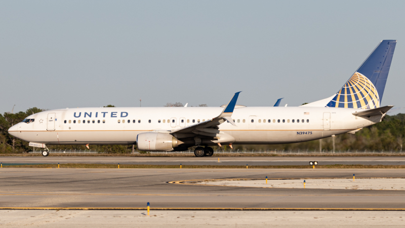 Photo of N39475 - United Airlines Boeing 737-900ER at MCO on AeroXplorer Aviation Database