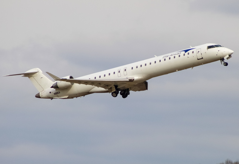 Photo of N900EA - Elite Airways Mitsubishi CRJ-900 at LUK on AeroXplorer Aviation Database