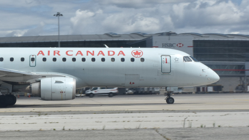 Photo of C-FHNV - Air Canada Embraer E190  at YYZ on AeroXplorer Aviation Database
