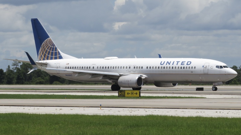 Photo of N66841 - United Airlines Boeing 737-900ER at MCO on AeroXplorer Aviation Database