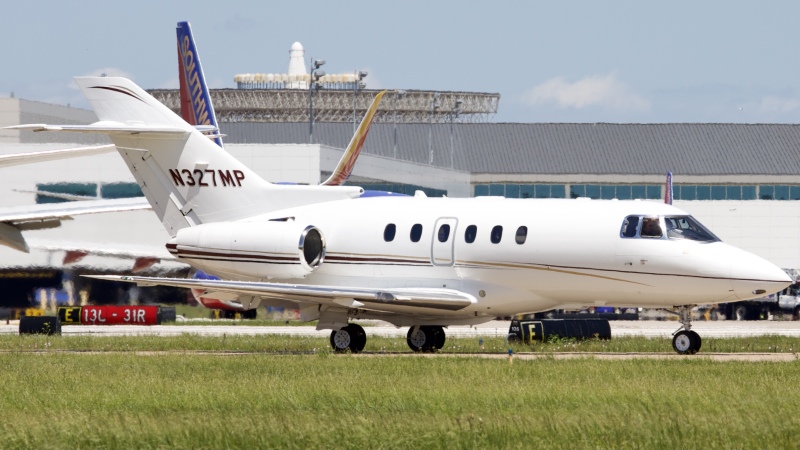 Photo of N327MP - PRIVATE Beechcraft Hawker 750 at HOU on AeroXplorer Aviation Database