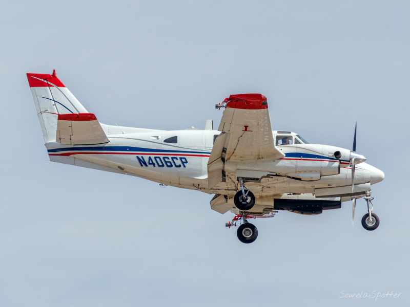 Photo of N406CP - PRIVATE Beech A90 at KCWF on AeroXplorer Aviation Database