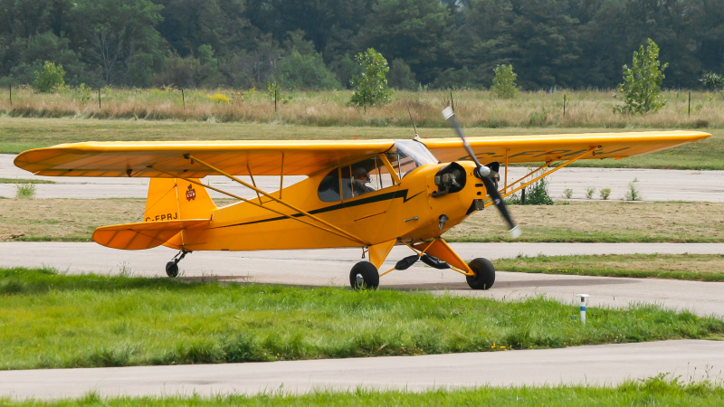 Photo of C-FPRJ - Private Piper J3C-65 Cub  at CZBA on AeroXplorer Aviation Database