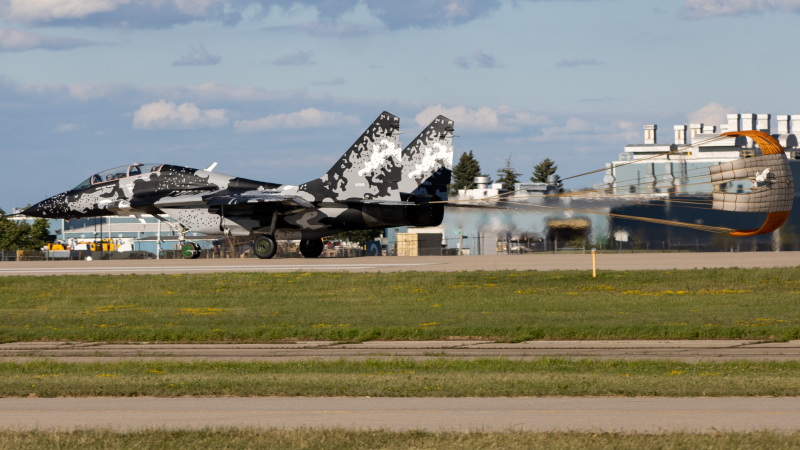 Photo of N29UB - PRIVATE Mikoyan-Gurevich MiG-29 at OSH on AeroXplorer Aviation Database