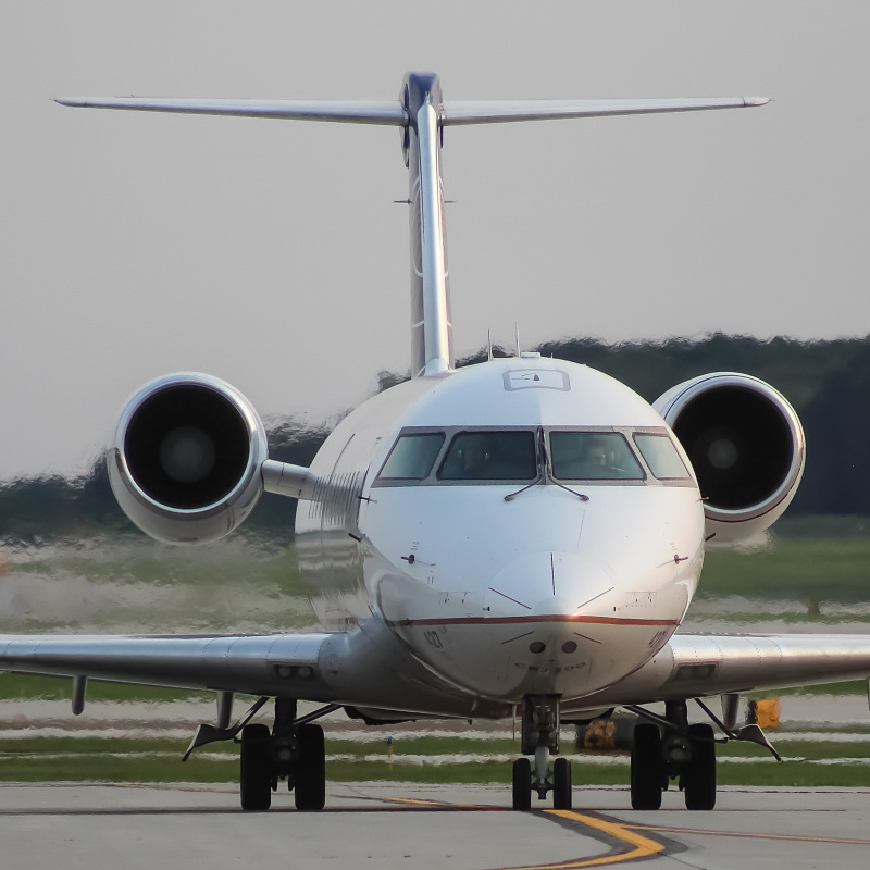 Photo of N427ZW - United Express Bombardier CRJ-200 at MKE on AeroXplorer Aviation Database