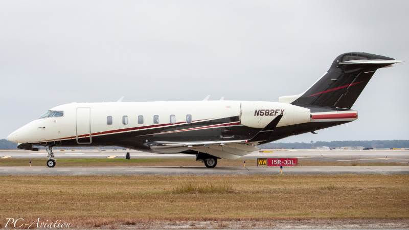 Photo of N582FX - PRIVATE Bombardier Challenger 300 at IAH on AeroXplorer Aviation Database