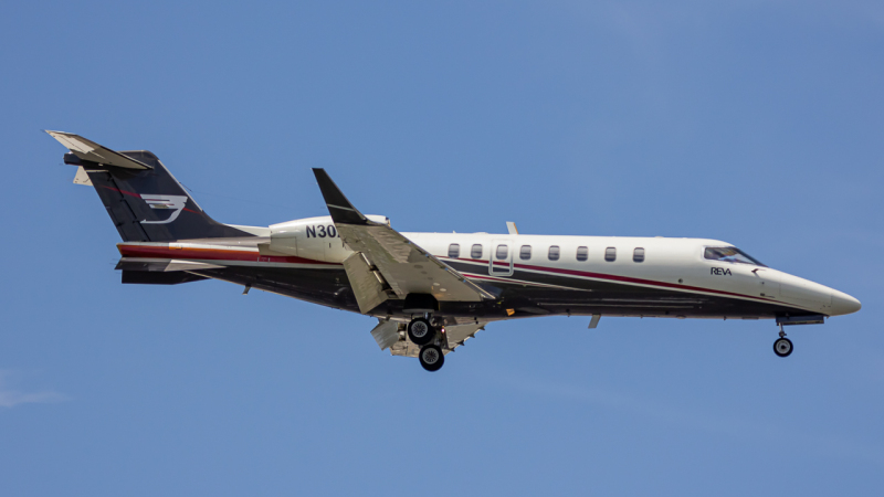 Photo of N302RV - PRIVATE Learjet 45 at MIA on AeroXplorer Aviation Database